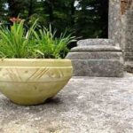 Tips To Purchase Outdoor Stone Planters For Your Back Yard